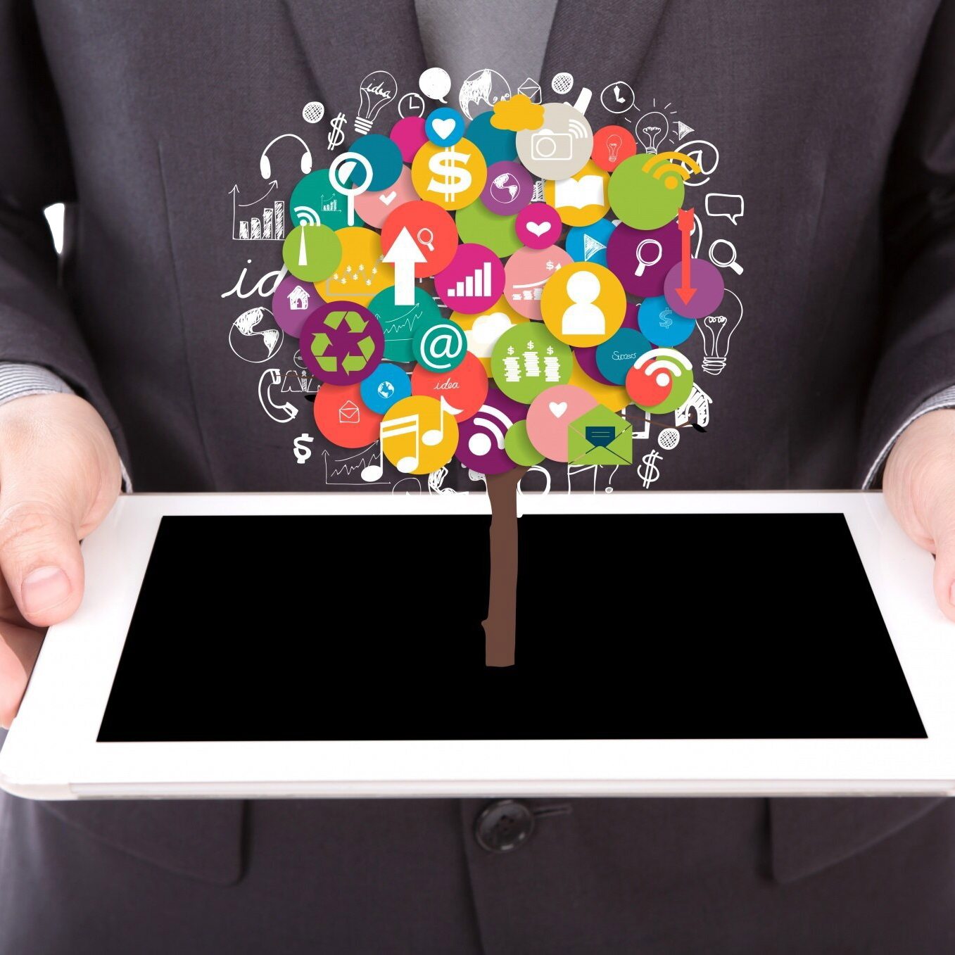 businessman-holding-tablet-with-colorful-icons